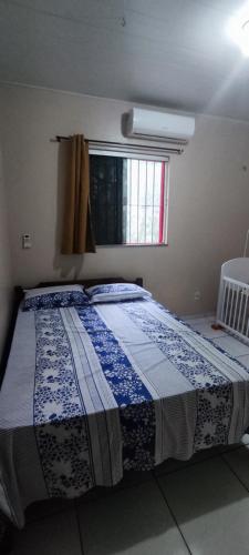 En eller flere senge i et værelse på Casa para cop 30