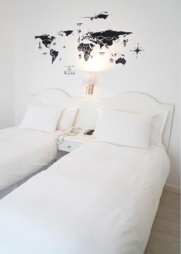 Postel nebo postele na pokoji v ubytování Hotel Romimar 3* Sup