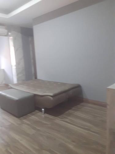 Ένα ή περισσότερα κρεβάτια σε δωμάτιο στο ChoChun Apartment