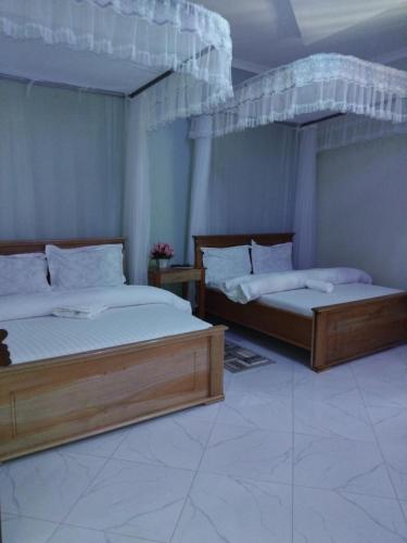 Ένα ή περισσότερα κρεβάτια σε δωμάτιο στο Sweetland view hotel