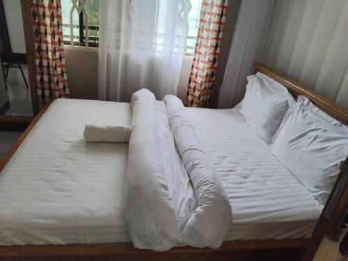 Ένα ή περισσότερα κρεβάτια σε δωμάτιο στο Sweetland view hotel