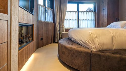 Postel nebo postele na pokoji v ubytování Mohe Boutique Hotel