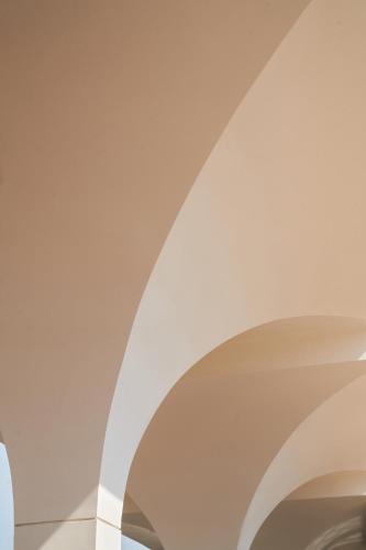 a white ceiling with an archway in a building at Pyramids Park Resort Cairo in Cairo