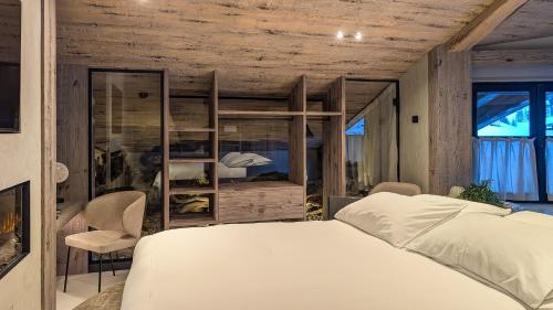 Postel nebo postele na pokoji v ubytování Mohe Boutique Hotel