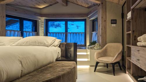 Postel nebo postele na pokoji v ubytování Mohe Boutique Hotel