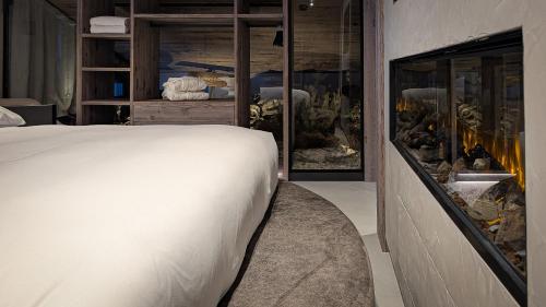 Postel nebo postele na pokoji v ubytování Mohe Boutique Hotel