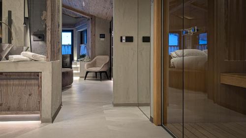 Postel nebo postele na pokoji v ubytování Mohe Boutique Hotel