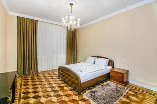 Llit o llits en una habitació de Bulvar Lux House