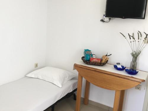 Ένα ή περισσότερα κρεβάτια σε δωμάτιο στο LEVADA