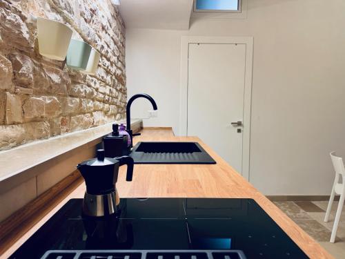 Küche/Küchenzeile in der Unterkunft Il Magazzeno della Prozia