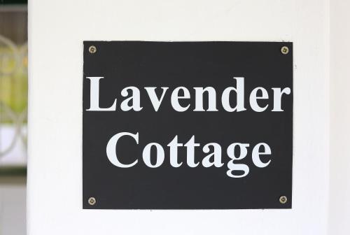 a sign that reads lavender coffee on a wall at Knorhoek Country Guesthouse in Stellenbosch