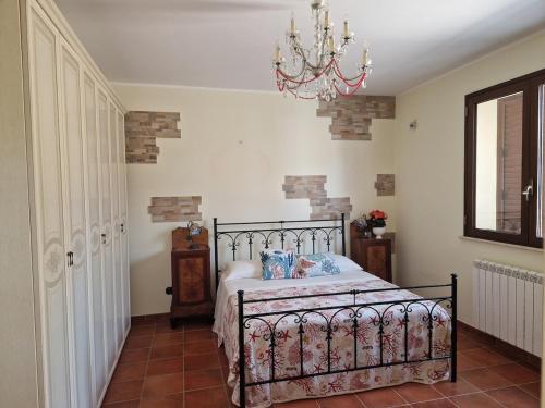 Postel nebo postele na pokoji v ubytování Villa Maestrale vacation home with sea view and Etna