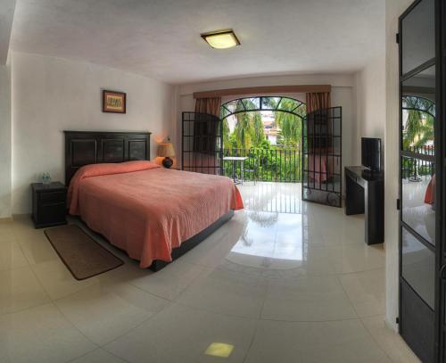 Cama o camas de una habitación en Hotel Posada San Javier