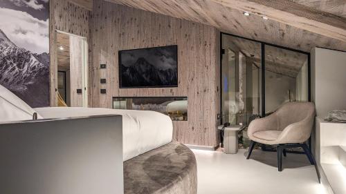 Postel nebo postele na pokoji v ubytování Mohe Boutique Hotel