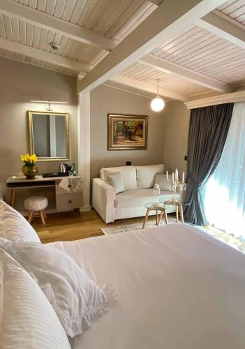 Postel nebo postele na pokoji v ubytování Le prince Rooms