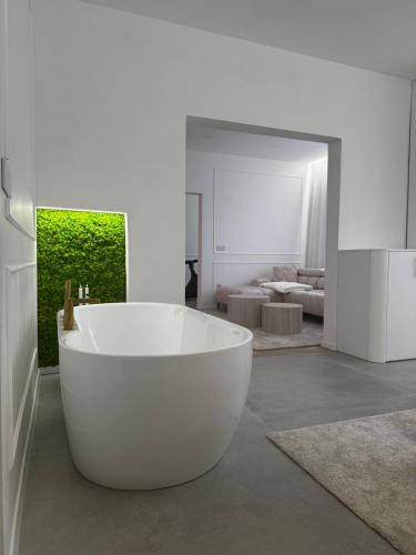 Ένα ή περισσότερα κρεβάτια σε δωμάτιο στο Trend Apartment
