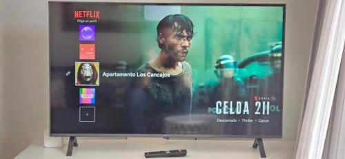 TV a/nebo společenská místnost v ubytování Los Cancajos Apartamento Acijoa