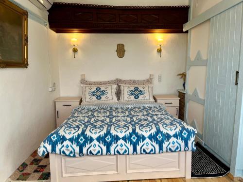 A bed or beds in a room at Mystic Konak