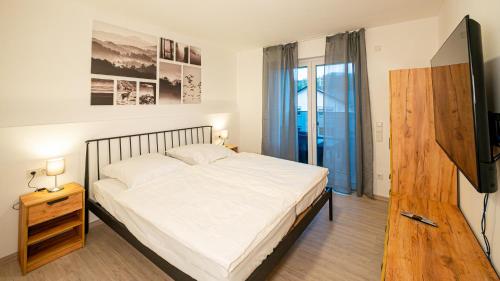 Postel nebo postele na pokoji v ubytování Ferienwohnung Lingg