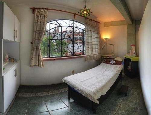 Cama o camas de una habitación en Hotel Posada San Javier