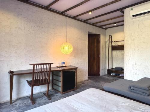 Cama o camas de una habitación en CasaWa Homestay Hue