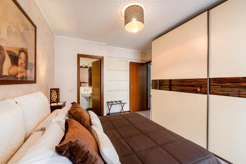 Postel nebo postele na pokoji v ubytování Casa delle Magnolie