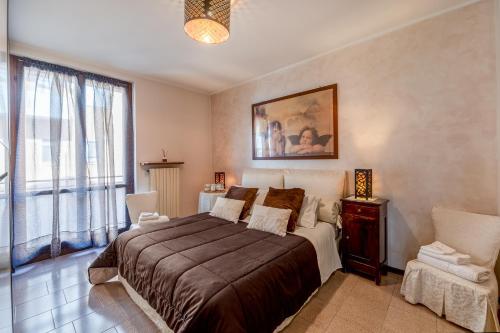 Postel nebo postele na pokoji v ubytování Casa delle Magnolie