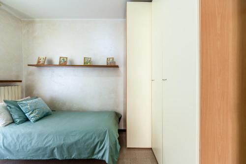 Postel nebo postele na pokoji v ubytování Casa delle Magnolie