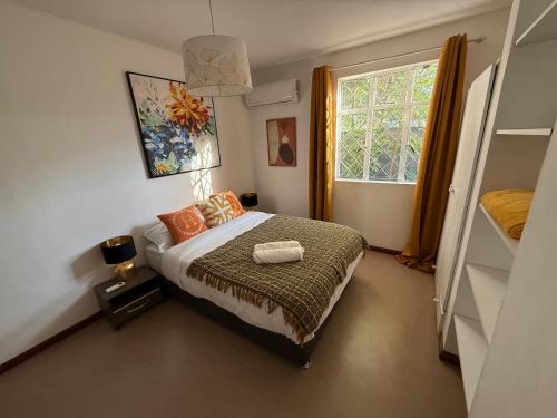 En eller flere senge i et værelse på Maison Lacoste, villa 150 m2, jardin 750m2