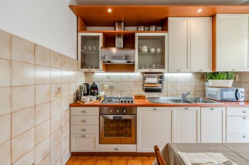 Kuchyň nebo kuchyňský kout v ubytování Casa delle Magnolie