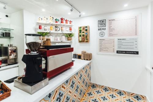 a coffee shop with a blender on a counter at TF Royal Hotel & Theatre in Castlebar