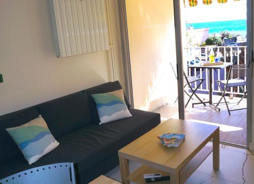 Et opholdsområde på Appartement Vue mer avec Piscine