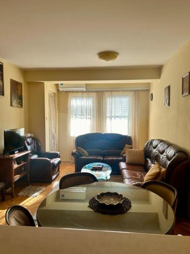 Predel za sedenje v nastanitvi City Center Flat