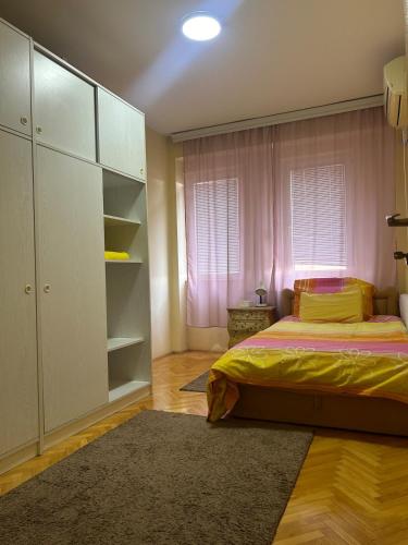 Postel nebo postele na pokoji v ubytování City Center Flat