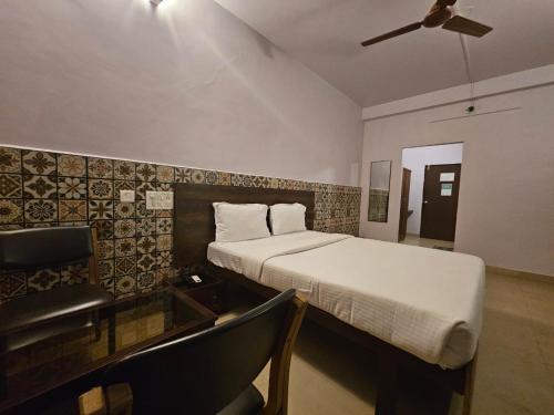Ένα ή περισσότερα κρεβάτια σε δωμάτιο στο Hotel Century Executive