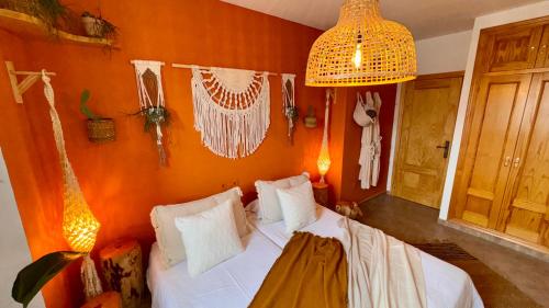 Ένα ή περισσότερα κρεβάτια σε δωμάτιο στο Yanes Bed And Breakfast Ronda