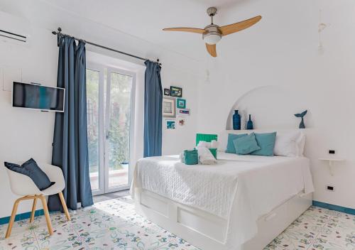 Ένα ή περισσότερα κρεβάτια σε δωμάτιο στο LA VILLA AURELIA