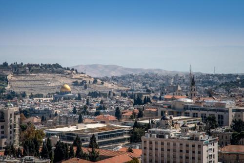 an aerial view of the city of jerusalem with the dome of the rock at Unique Masterpiece in the Heart of Jerusalem in Jerusalem