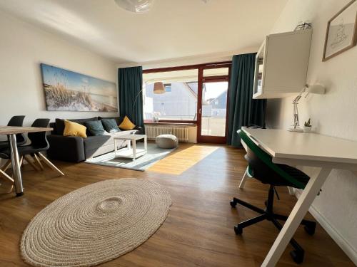 Posezení v ubytování Ferienwohnung für 4 Gäste in Grömitz