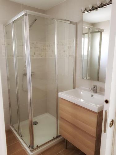 a bathroom with a shower and a sink at Casa Bonaire Dénia in Denia