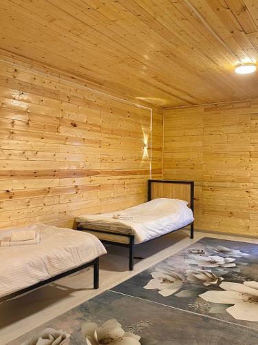 Postel nebo postele na pokoji v ubytování Bai Hotel