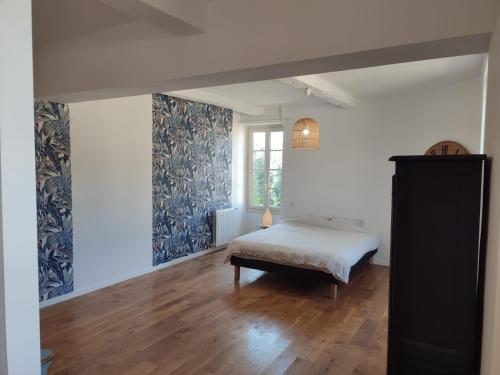 Postel nebo postele na pokoji v ubytování Manoir d Armagnac