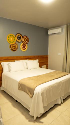 Ένα ή περισσότερα κρεβάτια σε δωμάτιο στο Beloalter Hotel Casa do Saulo