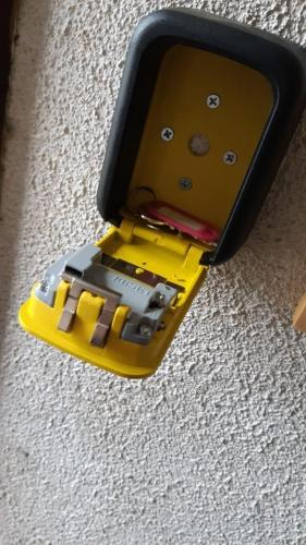 a lego phone is sitting on the floor at Cabañas Diarias in Valdivia