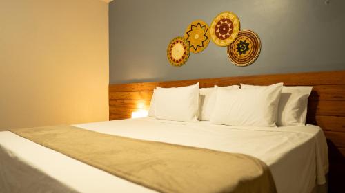 Ένα ή περισσότερα κρεβάτια σε δωμάτιο στο Beloalter Hotel Casa do Saulo