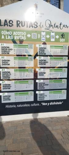 a sign on the side of a building at Casa El Rincón de Trini & Jose in Quéntar
