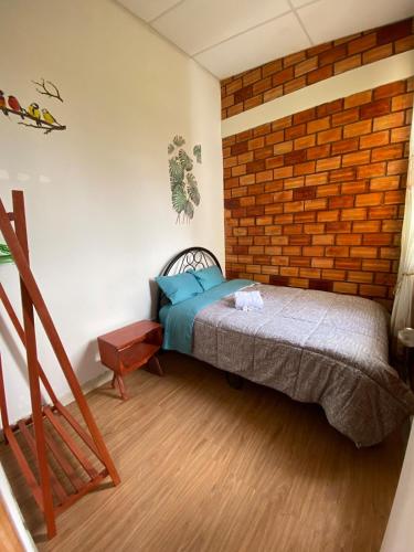 Postel nebo postele na pokoji v ubytování Moyobamba Hosting House