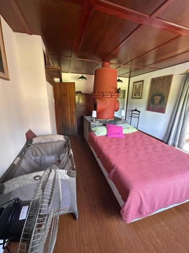 Ένα ή περισσότερα κρεβάτια σε δωμάτιο στο Casa de campo LA FRANCE SA