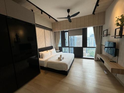 En eller flere senge i et værelse på The KLCC At Star SKY Pools