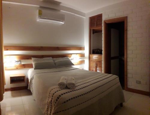 Letto o letti in una camera di La Estacion Gran Hotel